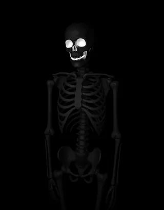 A smiling skeleton in a dark setting with slightly glowing eyes and mouth, set against a pitch-black background.