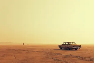 A post-apocalyptic wasteland with cracked, dry earth under a pale sun-bleached sky and an abandoned old car parked off-center, emphasizing desolation and isolation.