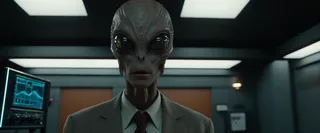 Cinematic film still of a photorealistic alien being interrogated in a sterile, dimly lit futuristic interrogation room with dramatic lighting and advanced technology.