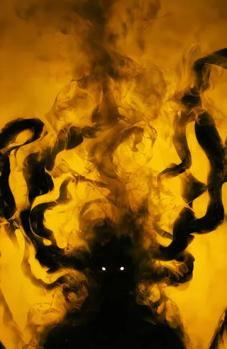 A dark shadowy figure with glowing white eyes is surrounded by swirling black tendrils and wispy smoke against a bright yellow-orange background, creating a stark contrast.
