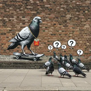 Street art graffiti on brick wall depicting a pigeon on a skateboard wearing a McDonald's fries necklace with several real pigeons nearby with question marks.