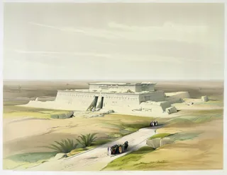 Color lithograph of ancient Egyptian monuments with earthy tones, showing figures walking along a pathway leading to a large desert stone structure.