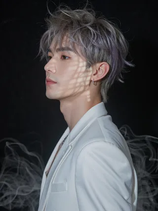 Close-up side profile of a young Korean man with silver and purple messy hair, wearing a sleek white suit jacket, illuminated by soft spotlight against a black background, with faint mist surrounding him.